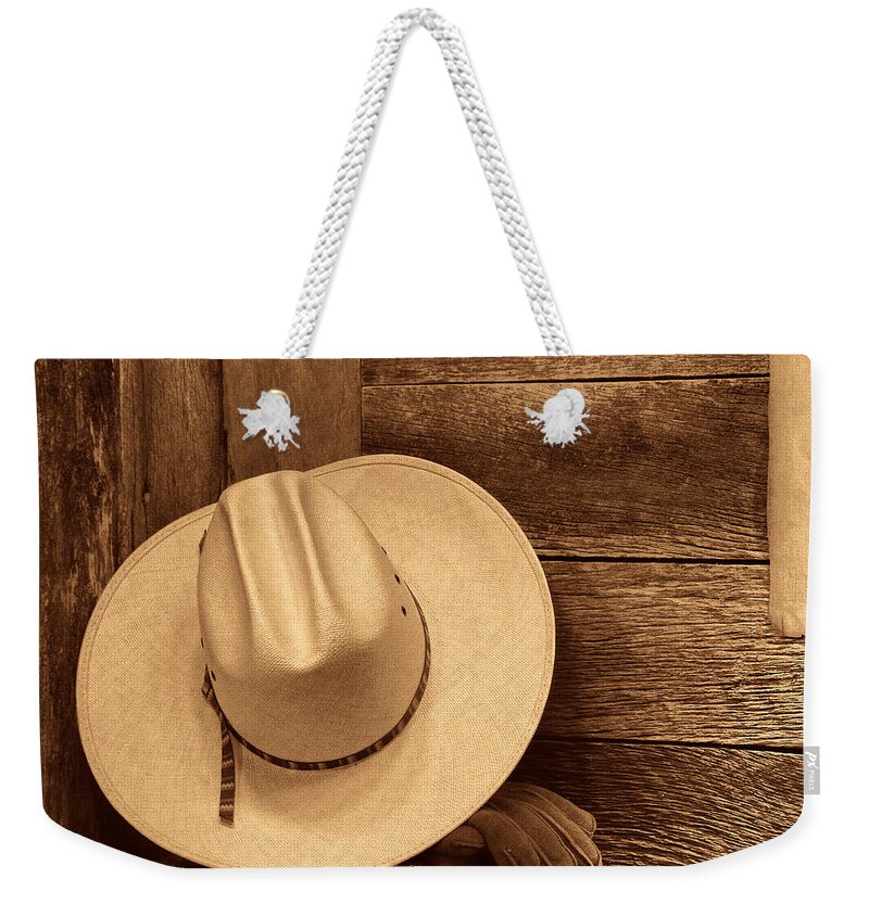 Cowboy Hat Weekender Tote Bag featuring the photograph Cowboy Hat in Town by American West Legend By Olivier Le Queinec