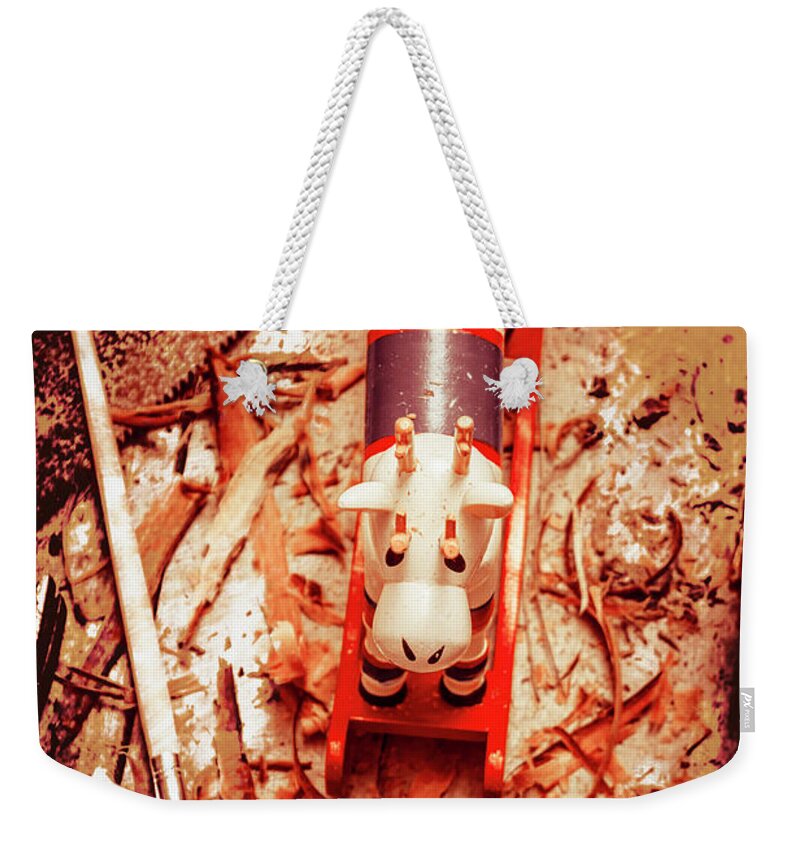Xmas Weekender Tote Bag featuring the photograph Crafting christmas presents by Jorgo Photography