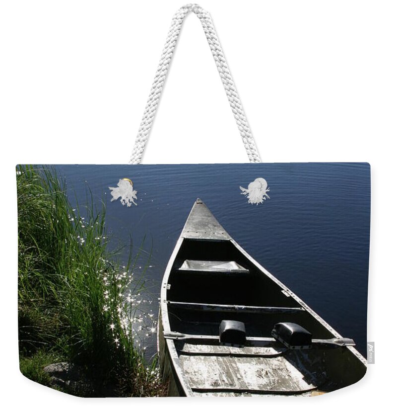 Canoe Weekender Tote Bag featuring the photograph Creekside Canoe by Jeff Floyd CA
