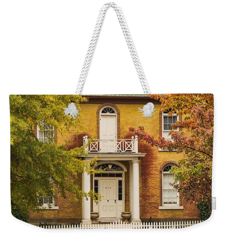 Jacksonville Oregon Weekender Tote Bag featuring the photograph Crooked White Fence by Dan McGeorge
