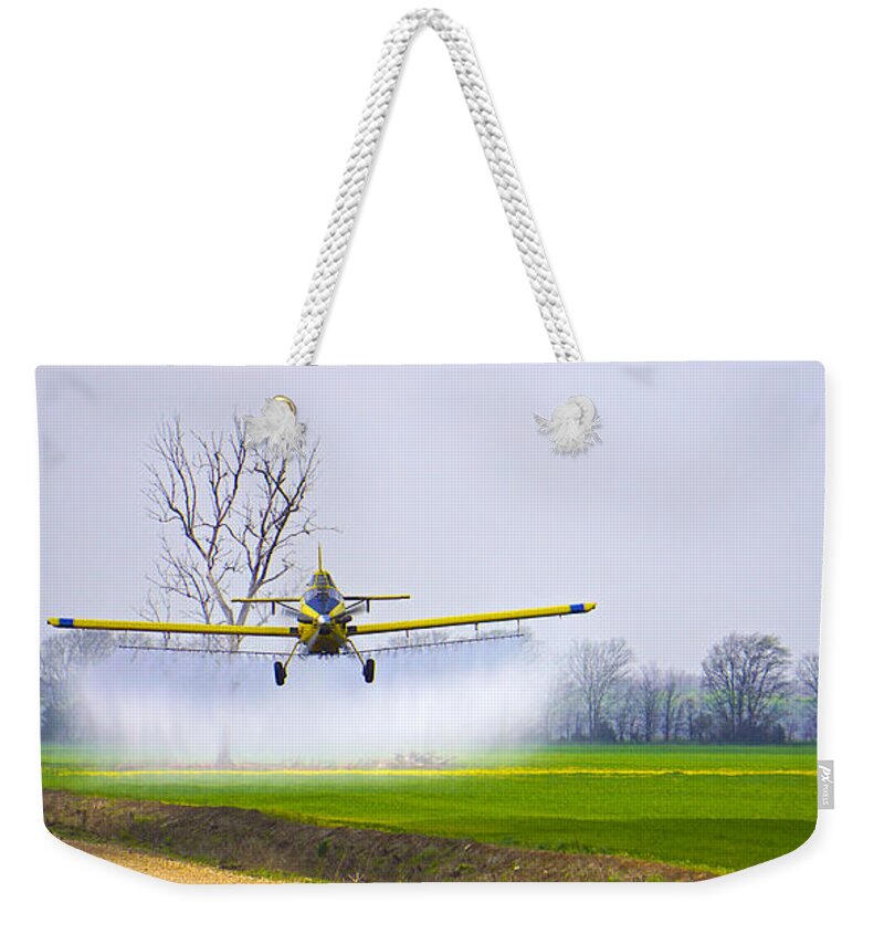 Precision Weekender Tote Bag featuring the photograph Precision Flying - Crop Dusting 1 of 2 by Norma Brock