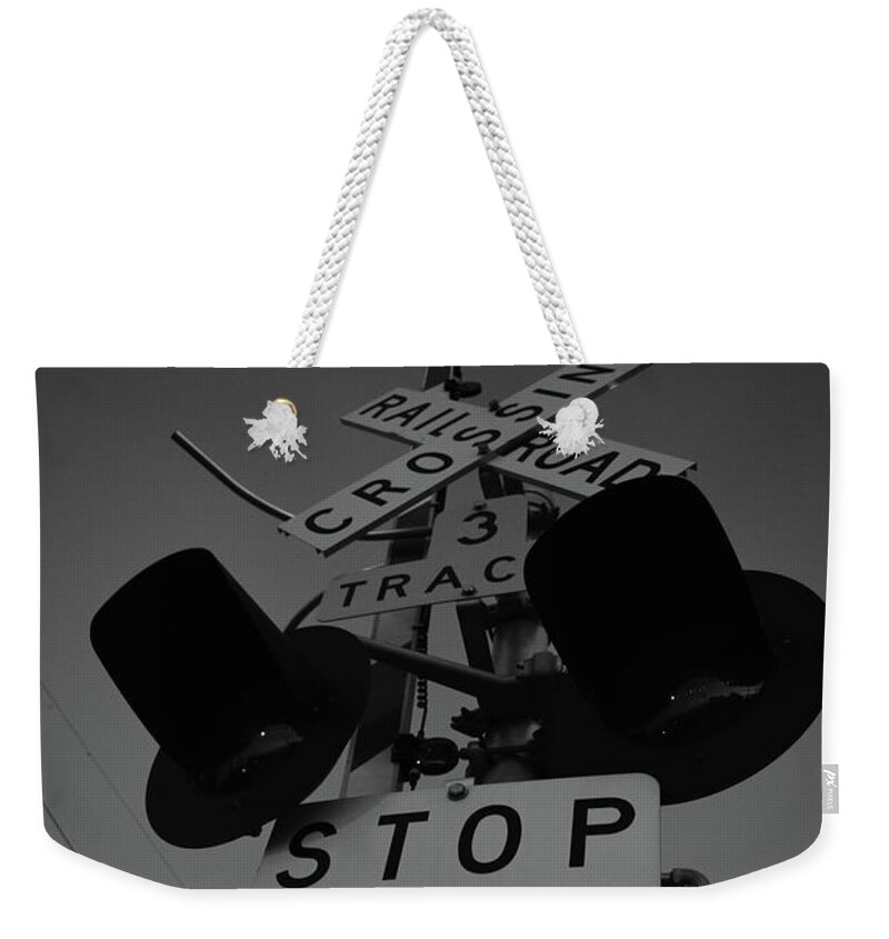 Railroad Weekender Tote Bag featuring the photograph Crossroads by Nicole Lloyd