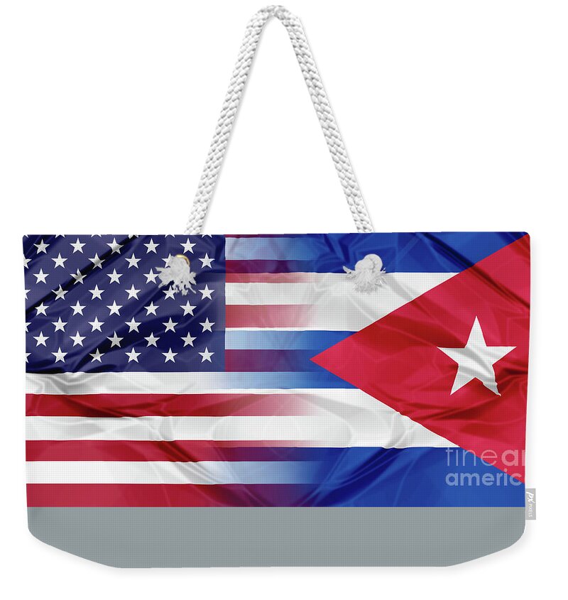 America Weekender Tote Bag featuring the photograph Cuba and USA flags by Benny Marty
