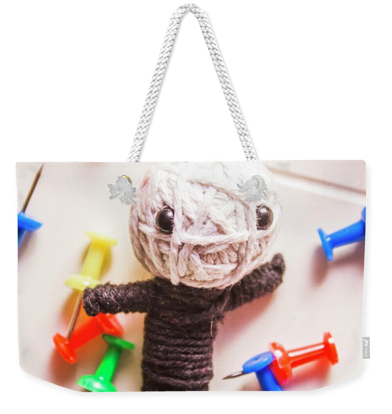 Sorcery Weekender Tote Bag featuring the photograph Cute doll made from yarn surrounded by pins by Jorgo Photography