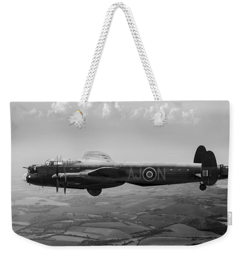 Lancaster Weekender Tote Bag featuring the photograph Dambusters Lancaster AJ-N black and white version by Gary Eason