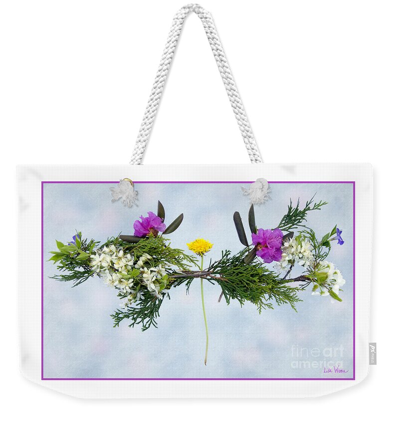 Lise Winne Weekender Tote Bag featuring the photograph Dandelion Balancing Act with Blue Background by Lise Winne