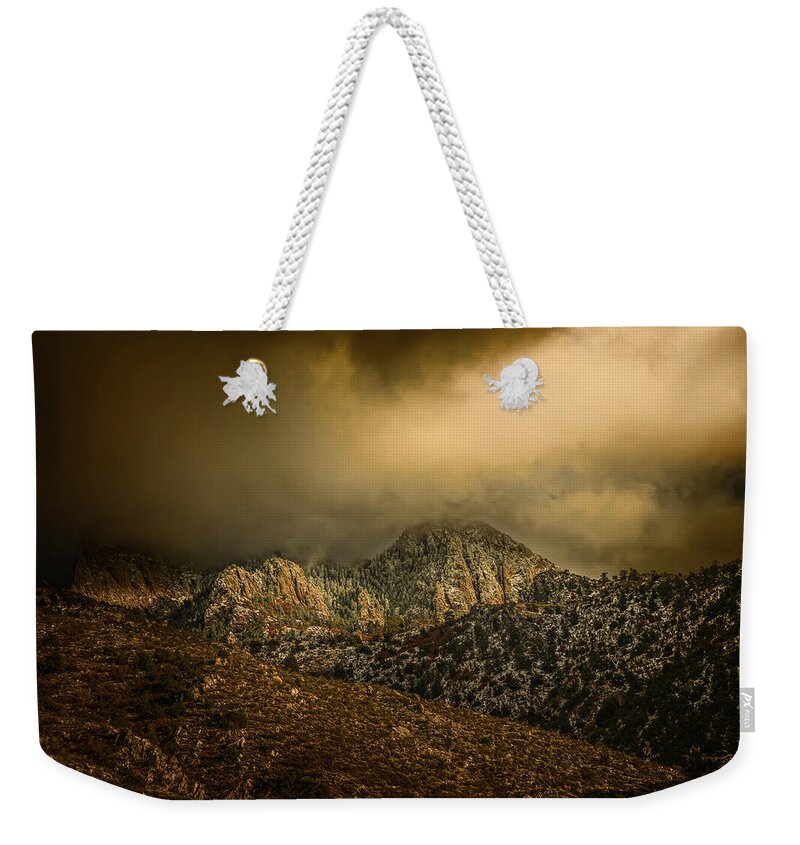 Landscape Weekender Tote Bag featuring the photograph Darkness Falls Over the Sandias by Michael McKenney