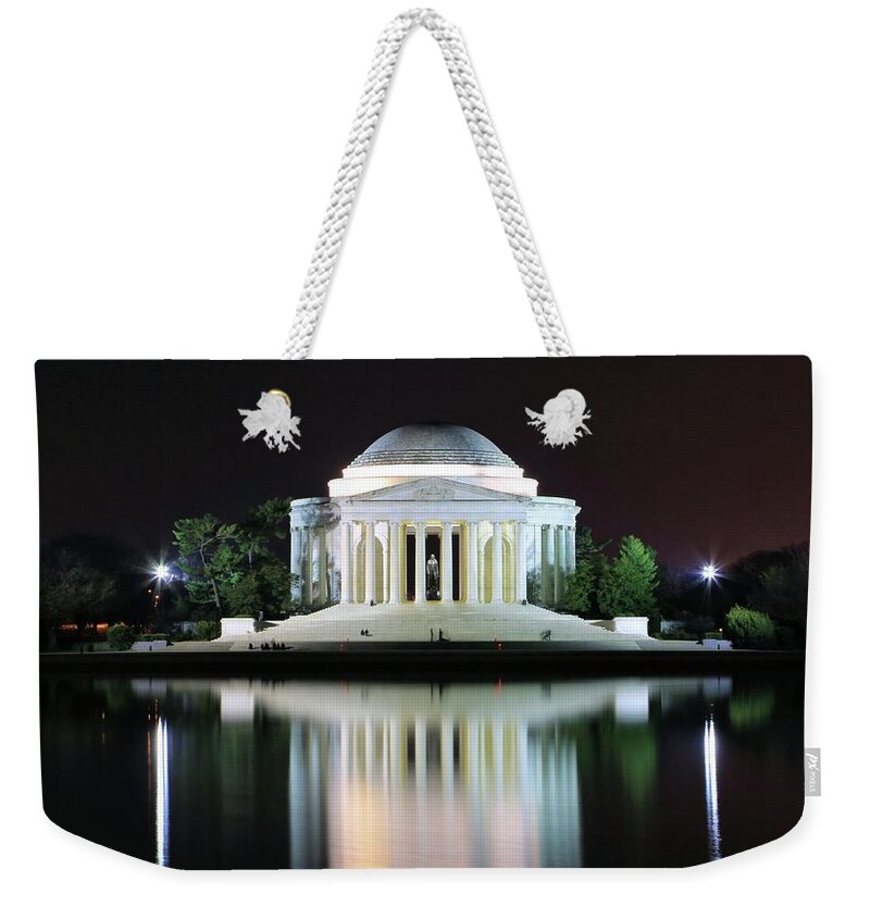 Photosbymch Weekender Tote Bag featuring the photograph Darkness over the Jefferson Memorial by M C Hood