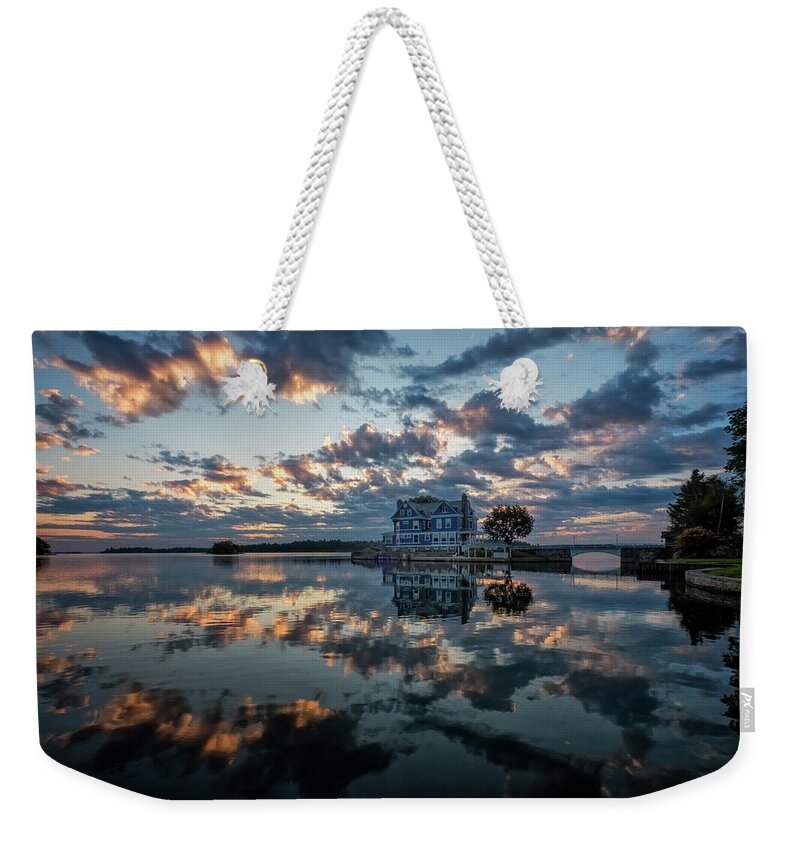 St Lawrence Seaway Weekender Tote Bag featuring the photograph Dawn On The River by Tom Singleton