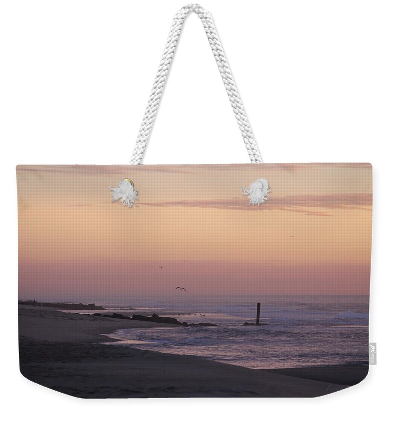 Beach Weekender Tote Bag featuring the photograph Dawns Purple Hues by Robert Banach