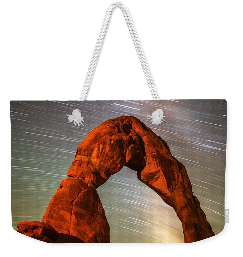 Delicate Arch Weekender Tote Bag featuring the photograph Delicate Arch Star Trails by Darren White