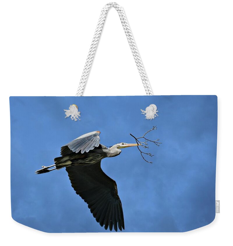 Great Blue Heron Weekender Tote Bag featuring the photograph Delivery by Fraida Gutovich
