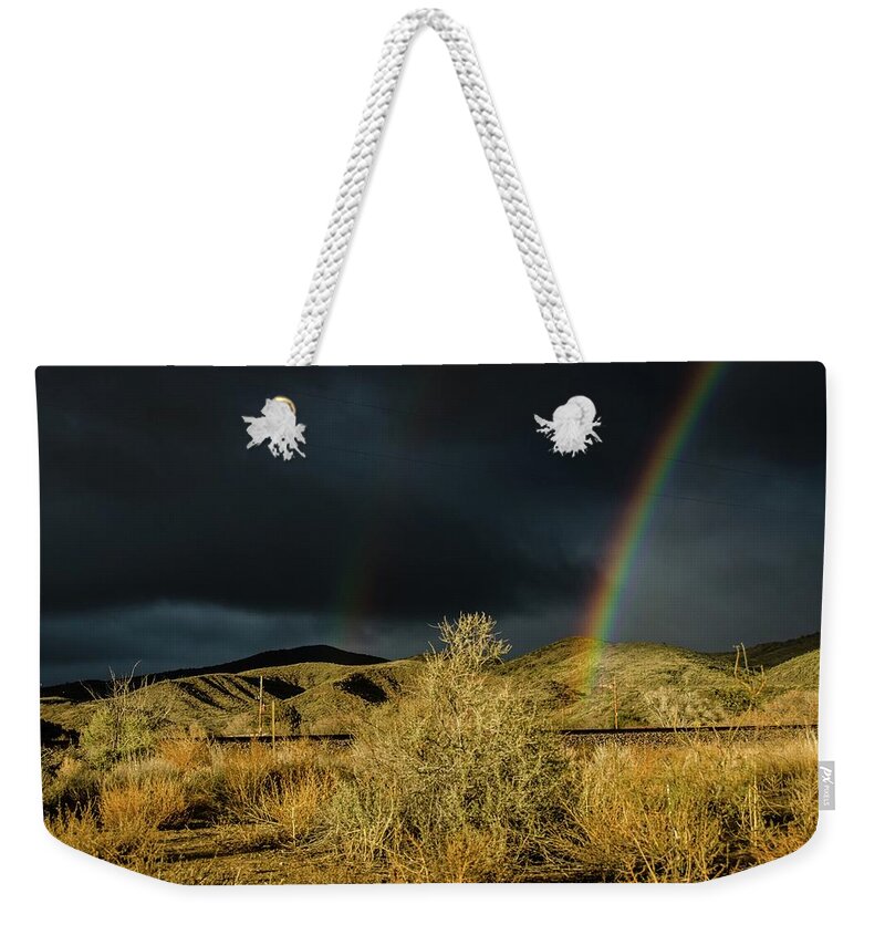 Double Weekender Tote Bag featuring the photograph Desert double rainbow by Gaelyn Olmsted