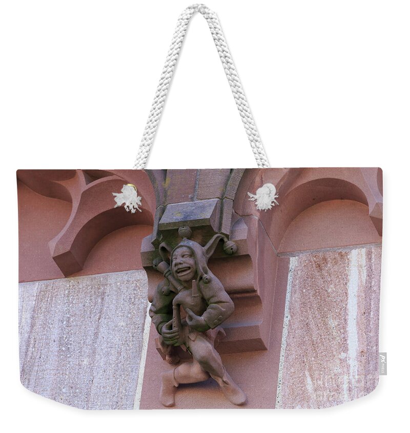 Stone Weekender Tote Bag featuring the photograph Detail of stone carving on the Spalentor in Basel Switz by Louise Heusinkveld