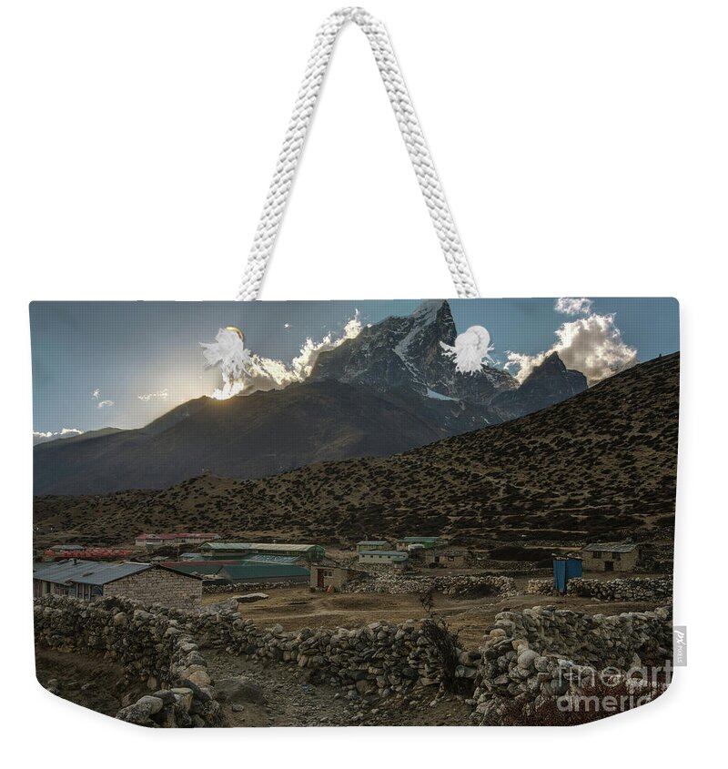 Everest Weekender Tote Bag featuring the photograph Dingboche Evening Sunrays by Mike Reid