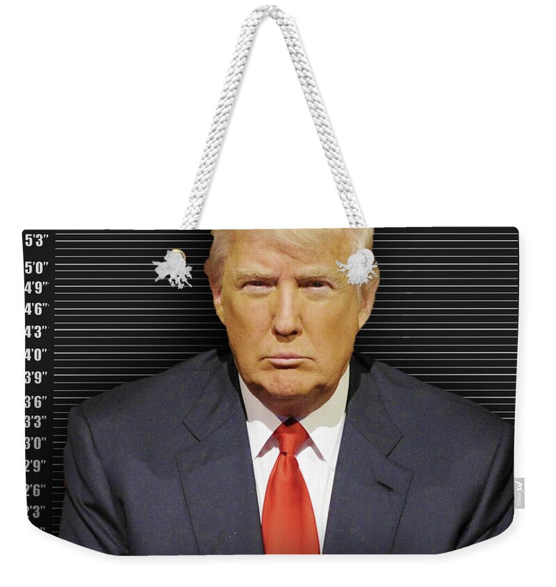 Donald Trump Weekender Tote Bag featuring the photograph Donald Trump Mugshot by Tony Rubino