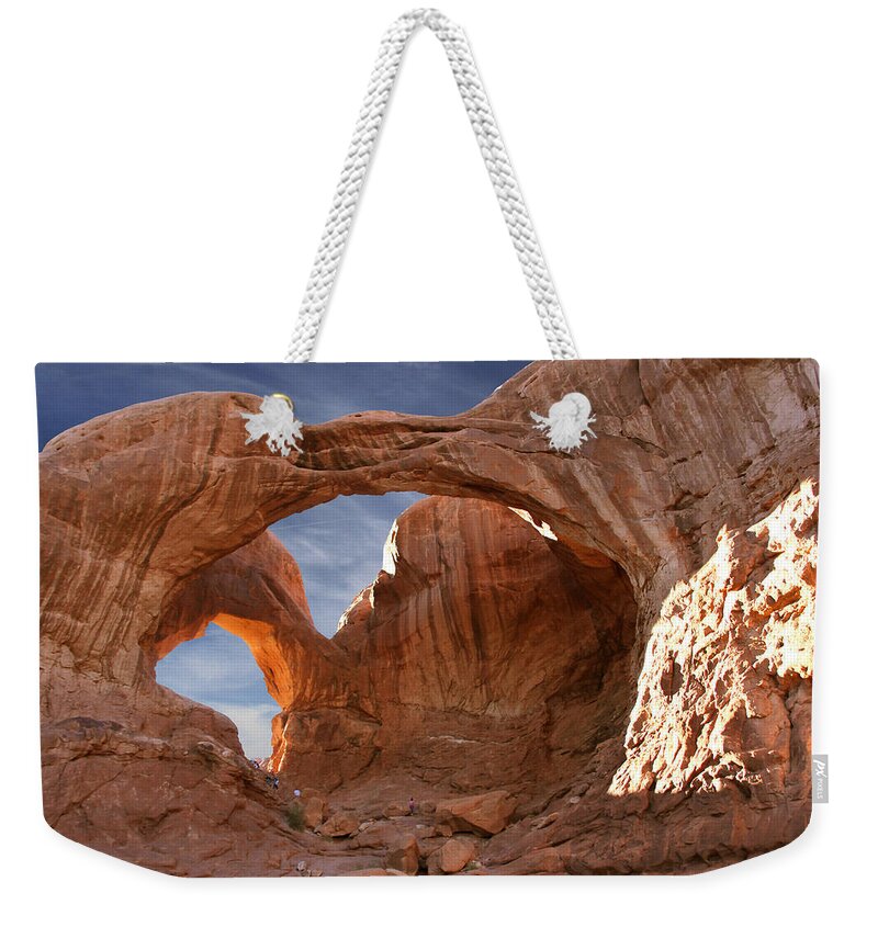 Desert Weekender Tote Bag featuring the photograph Double Arch in Late Afternoon by Mike McGlothlen
