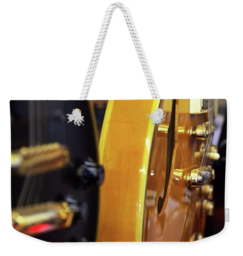 Instruments Weekender Tote Bag featuring the photograph Double Whammy by Stephen Melia