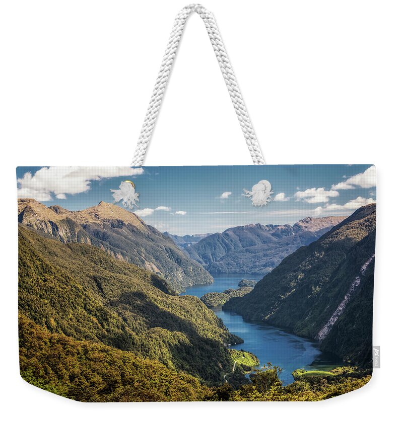 New Zealand Weekender Tote Bag featuring the photograph Doubtful Sound New Zealand from Wilmot Pass by Joan Carroll