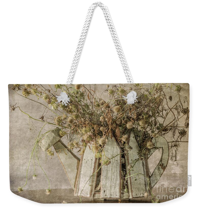 Dried Flowers Weekender Tote Bag featuring the photograph Dried Flowers in Watering Can by Tamara Becker