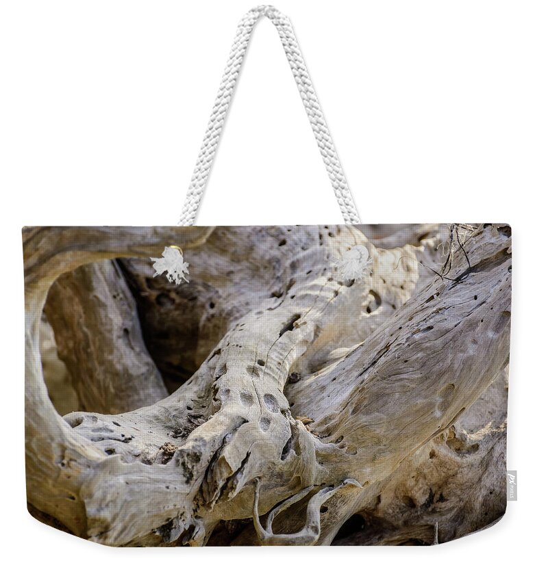 Driftwood Weekender Tote Bag featuring the photograph Driftwood on the Beach by Robert Mitchell