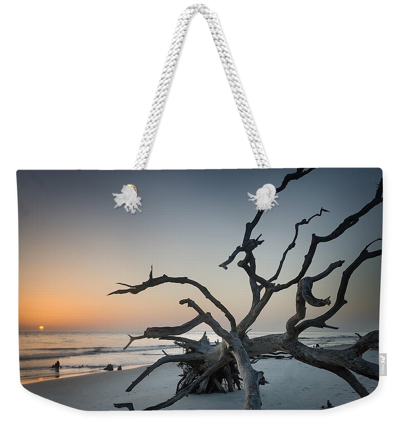 Sunrise Weekender Tote Bag featuring the photograph Driftwood Sunrise by John Kirkland