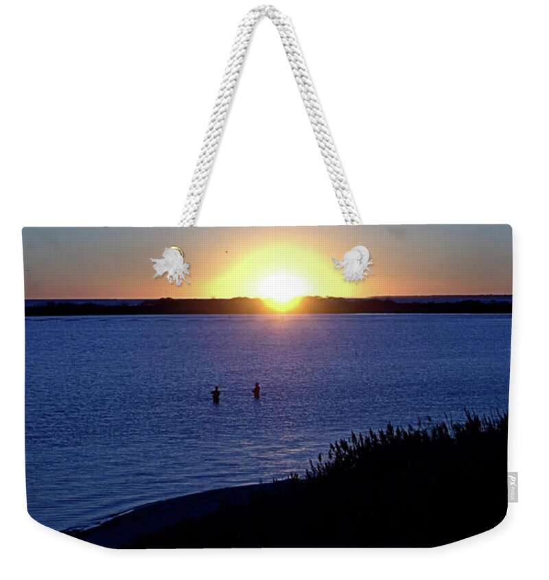 Fishing Weekender Tote Bag featuring the photograph Dusk by Newwwman