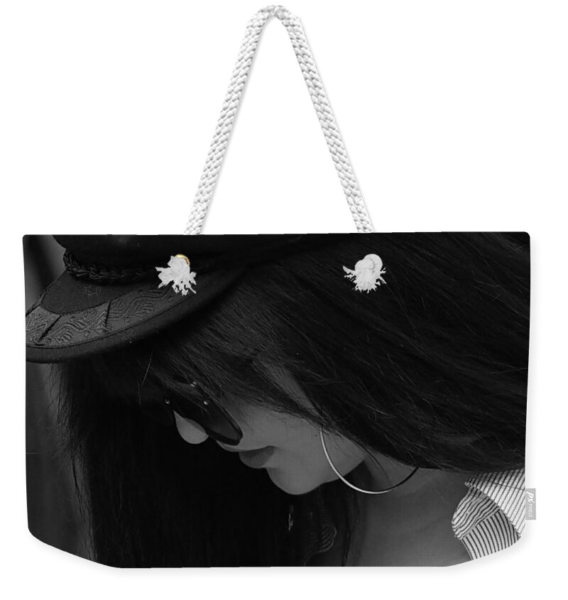 Model Weekender Tote Bag featuring the photograph Ear Ring by Farol Tomson