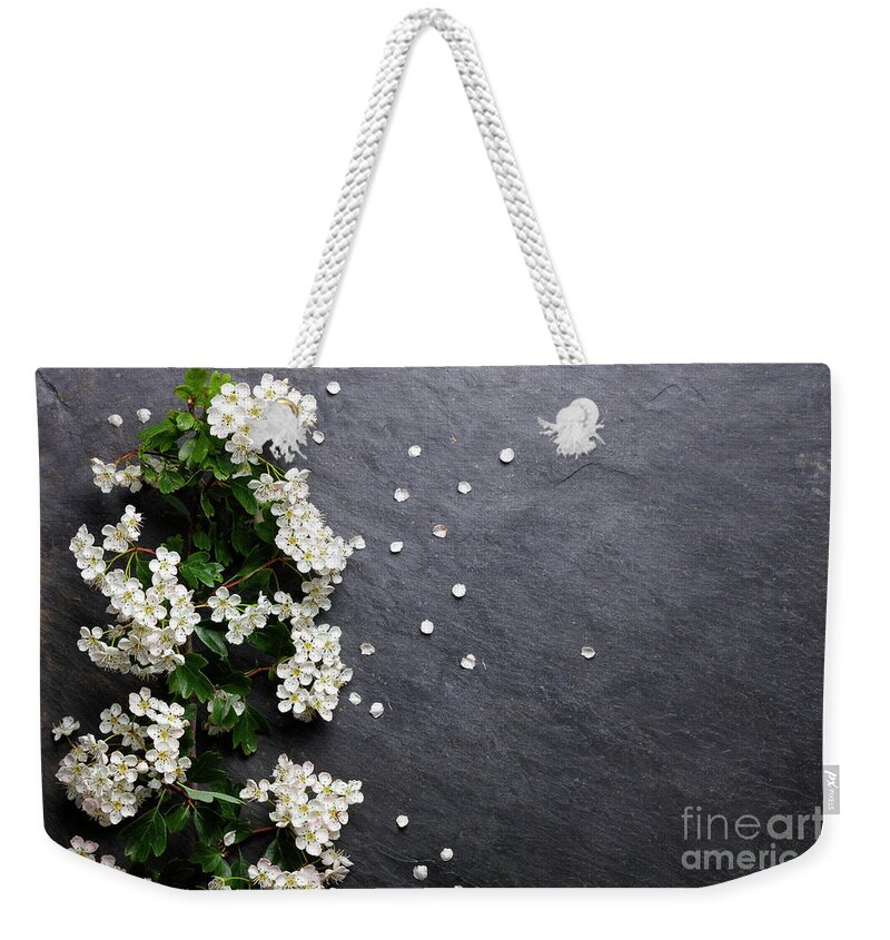 Spring Weekender Tote Bag featuring the photograph Early summer white flower blossoms by Nicholas Burningham