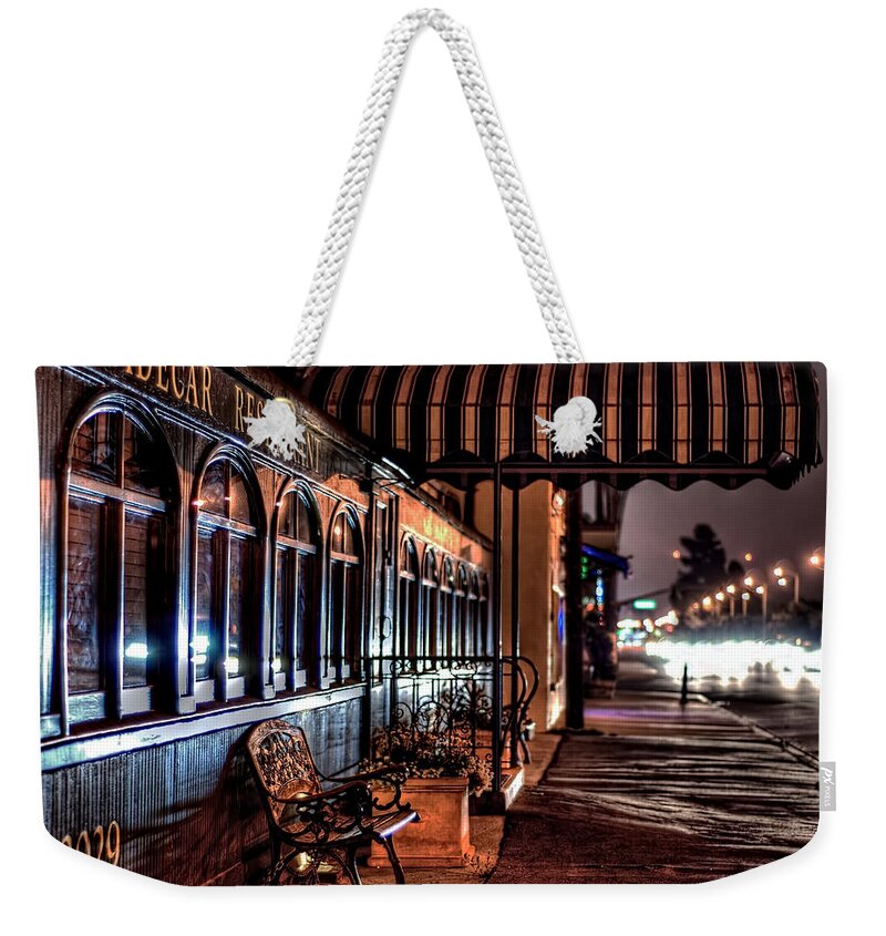 Night Bench Cityscape Sidecar Train Restaurant  Weekender Tote Bag featuring the photograph Eatery by Wendell Ward