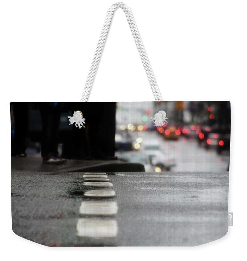 Street Photography Weekender Tote Bag featuring the photograph Echoes in the rain drops by J C