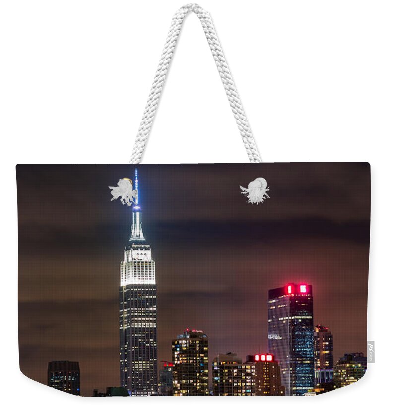Skyscraper Weekender Tote Bag featuring the photograph Eclipse by Mihai Andritoiu
