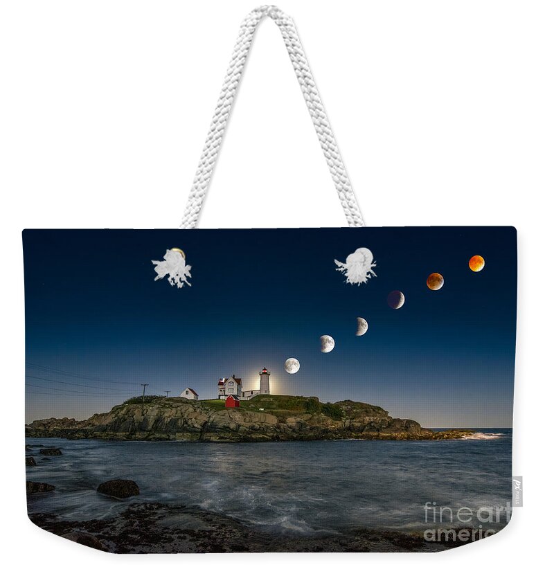 Nubble Lighthouse Weekender Tote Bag featuring the photograph Eclipsing the Nubble by Scott Thorp