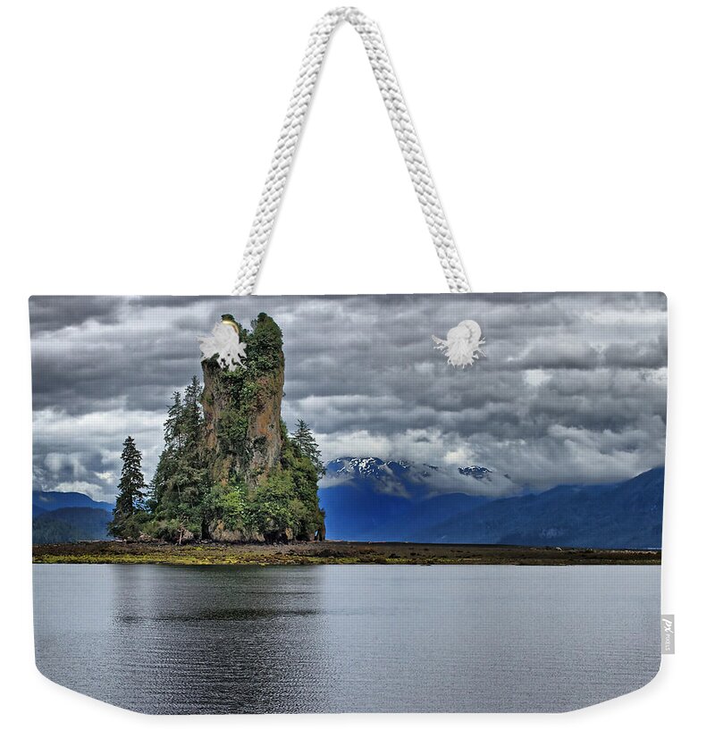 Eddystone Weekender Tote Bag featuring the photograph Eddystone Rock in Misty Fjords National Monument by Farol Tomson