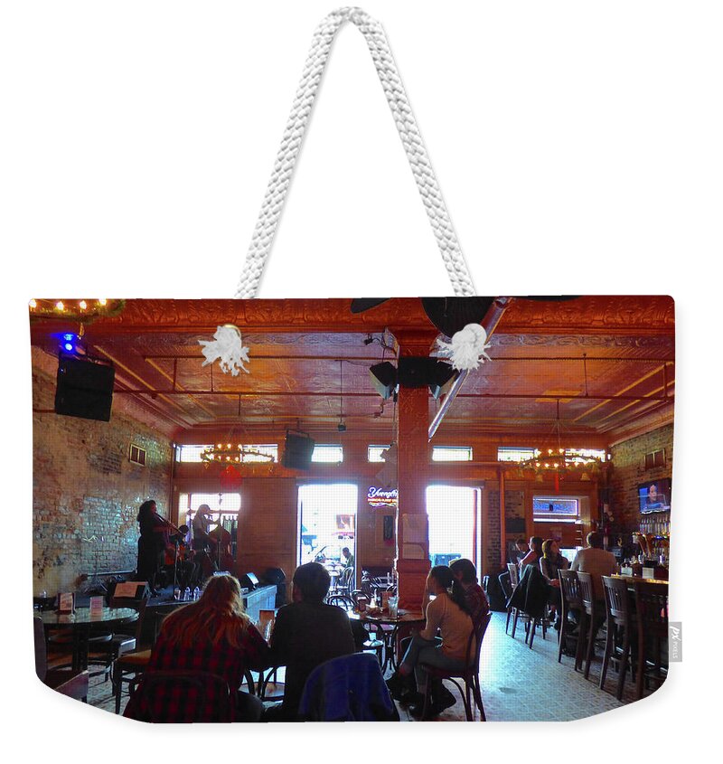 New Orleans Weekender Tote Bag featuring the photograph Eh La Bas Trio at Bamboula's by Amelia Racca