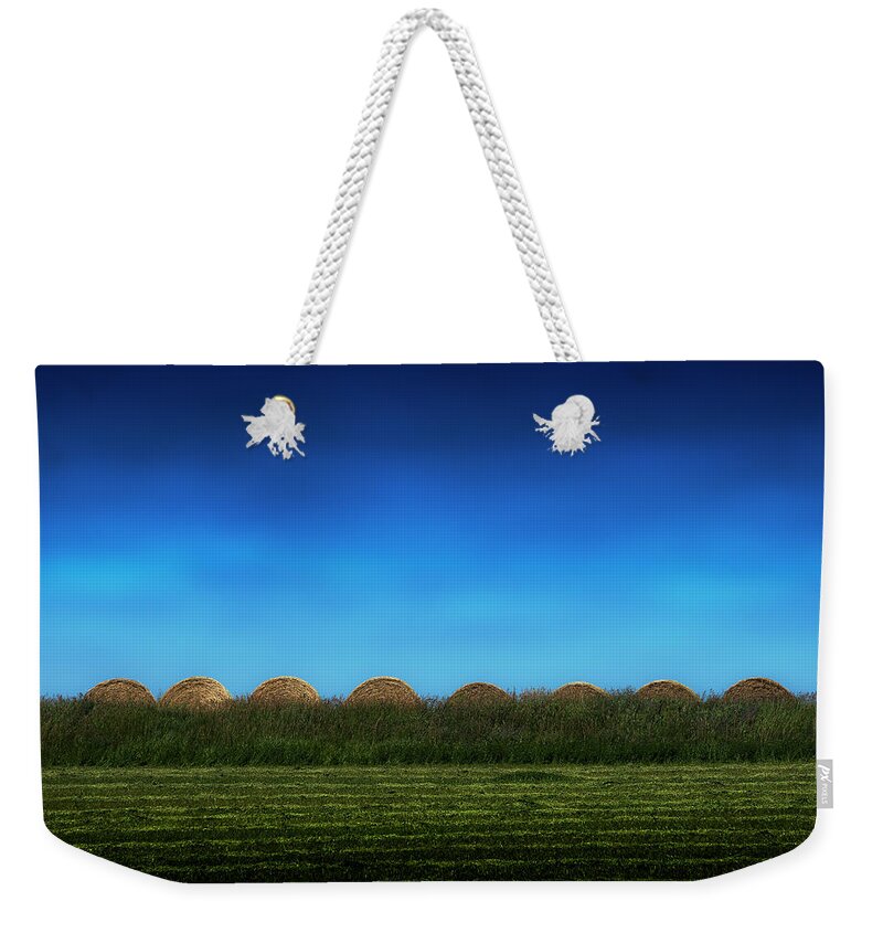 Blumwurks Weekender Tote Bag featuring the photograph Eight Rolls by Matthew Blum