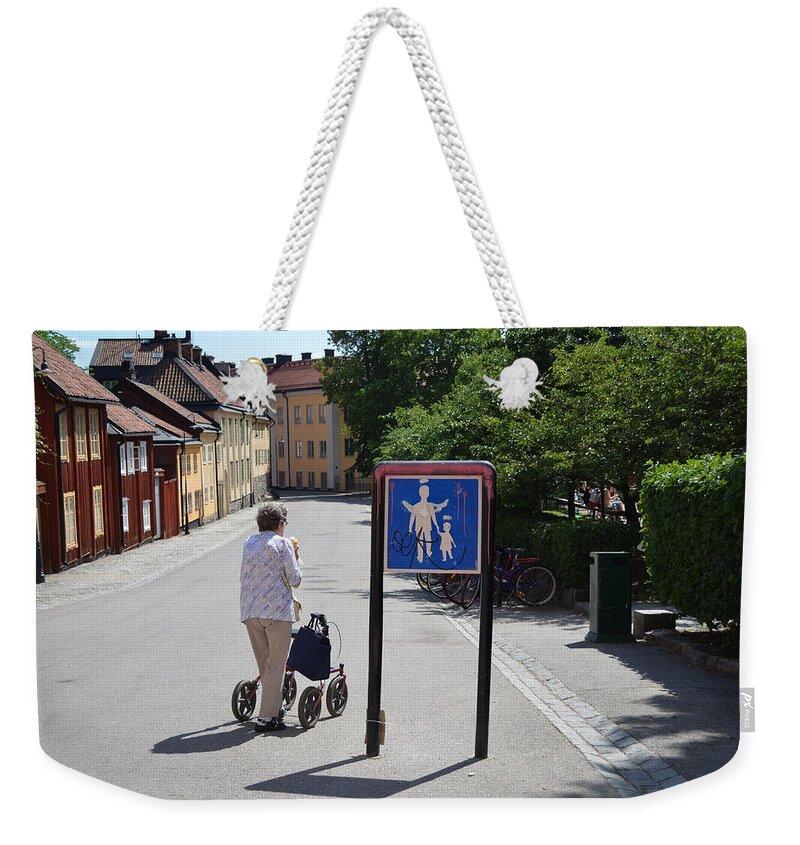 Stockholm Weekender Tote Bag featuring the photograph Elderly Woman in Stockholm by Erik Burg