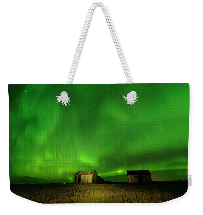 Granaries Weekender Tote Bag featuring the photograph Electric Green Skies by Dan Jurak