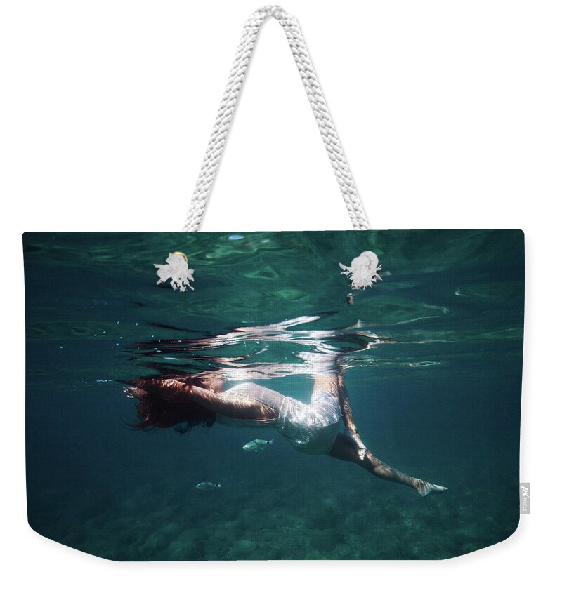 Swim Weekender Tote Bag featuring the photograph Elegant Mermaid by Gemma Silvestre