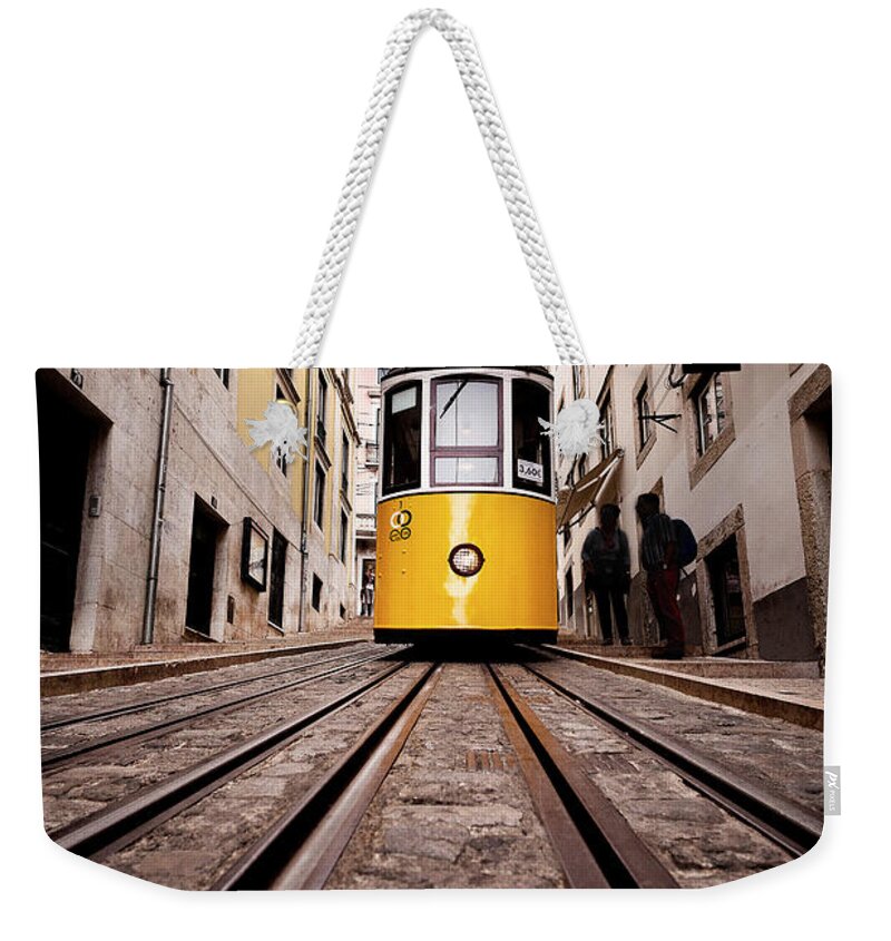 Lisbon Weekender Tote Bag featuring the photograph Elevador da Bica by Jorge Maia