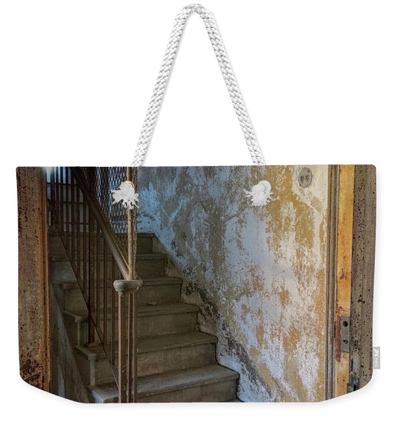 Jersey City New Jersey Weekender Tote Bag featuring the photograph Ellis Island Stairs by Tom Singleton