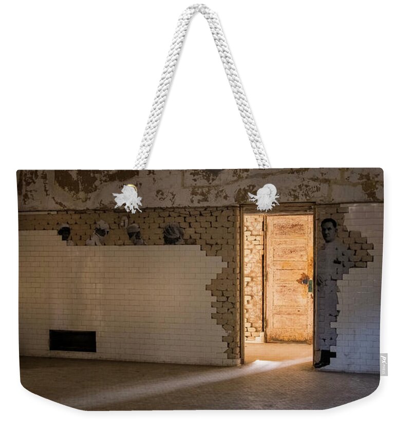 Jersey City New Jersey Weekender Tote Bag featuring the photograph Ellis Lighted Doorway by Tom Singleton