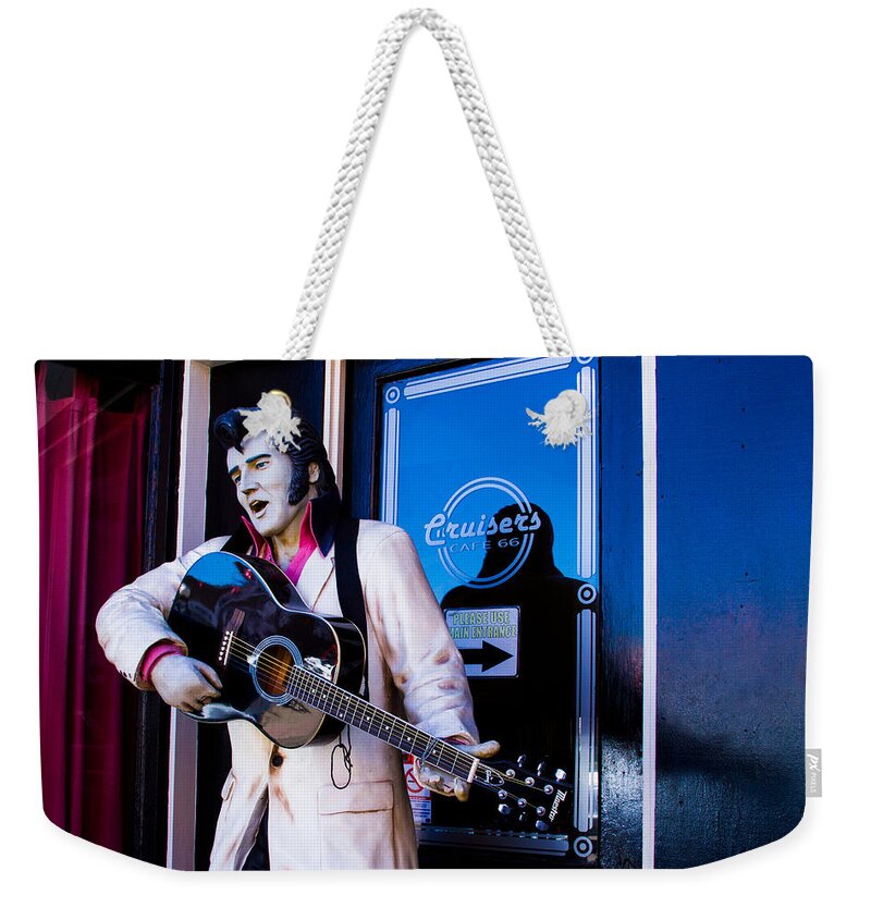 Elvis Tribute In Williams Az Weekender Tote Bag featuring the photograph Elvis Tribute in Williams AZ by Bonnie Follett