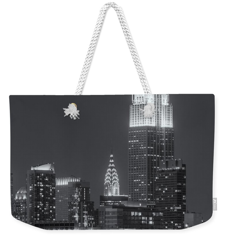 Clarence Holmes Weekender Tote Bag featuring the photograph Empire State and Chrysler Buildings at Twilight II by Clarence Holmes