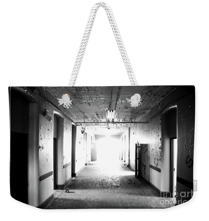 Grand Traverse Asylum Weekender Tote Bag featuring the photograph End of the Hall by Randall Cogle
