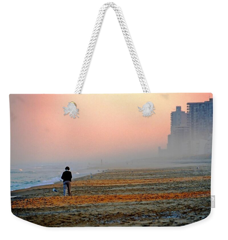 Beach Weekender Tote Bag featuring the photograph Evening stroll by Bill Jonscher