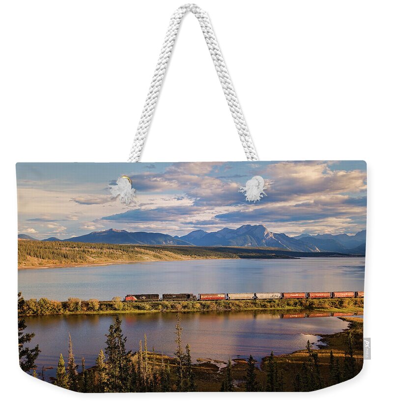 Train Weekender Tote Bag featuring the photograph Evening Train by Deborah Penland