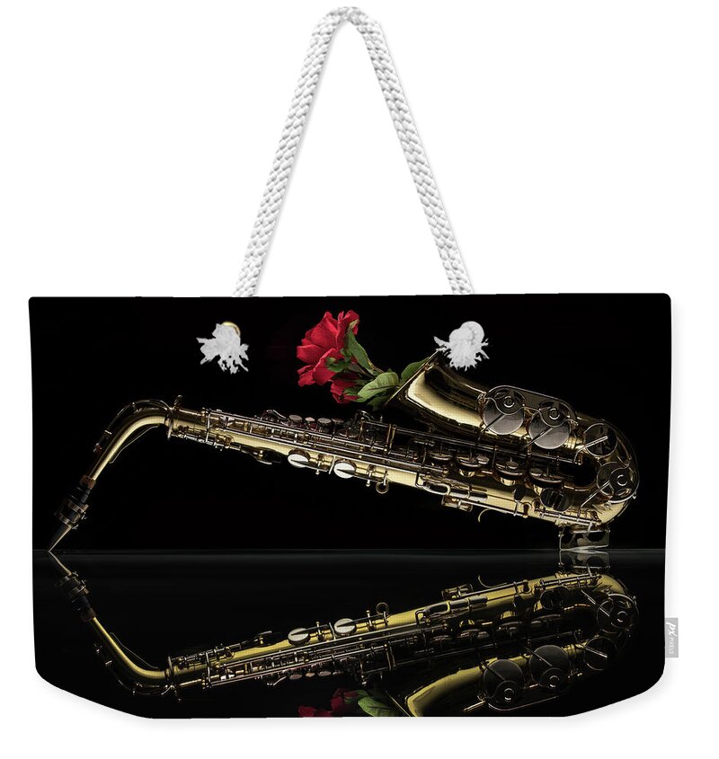 Saxophone Weekender Tote Bag featuring the photograph Every Rose Has Its Horn by Dario Impini
