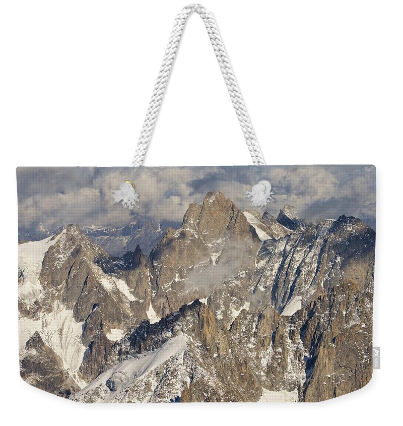 Aiguille Du Midi Weekender Tote Bag featuring the photograph Eye of the Needle by Stephen Taylor