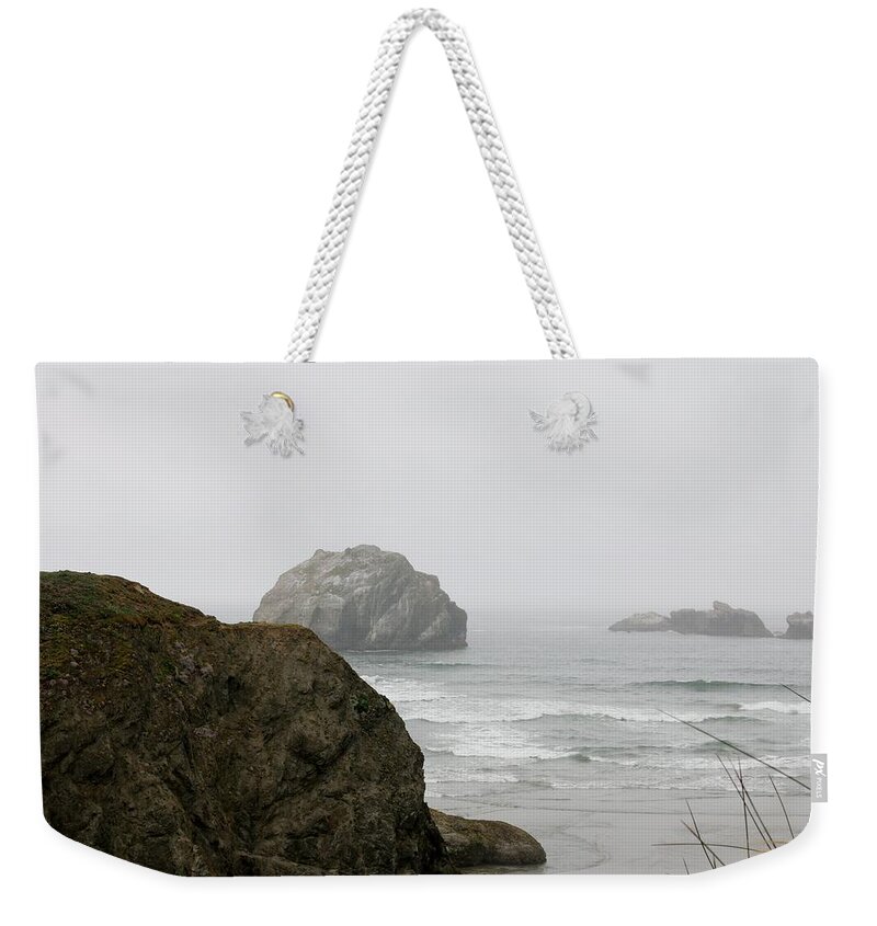 Face Rock Weekender Tote Bag featuring the photograph Face in the Sea by Christy Pooschke
